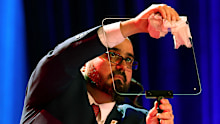 Gabriel Perez cleans a teleprompter for Trump in 2024.