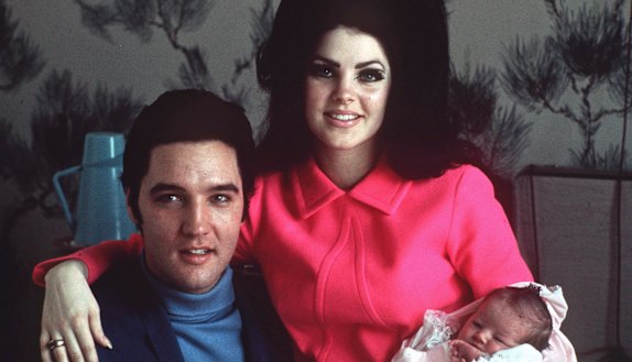 Elvis Presley with wife Priscilla and daughter Lisa Marie in a Memphis hospital four days after she was born in February 1968.