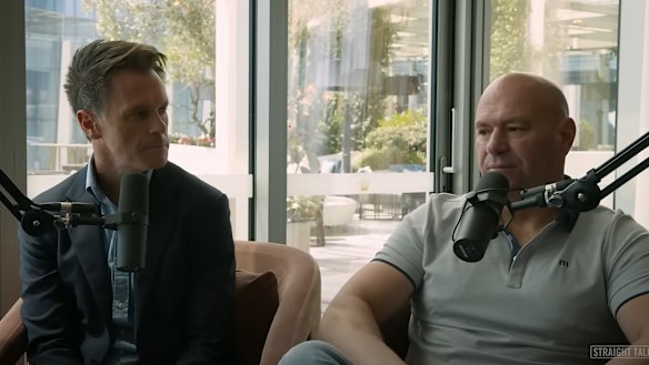 Chris Minns shares a mic with UFC boss Dana White.