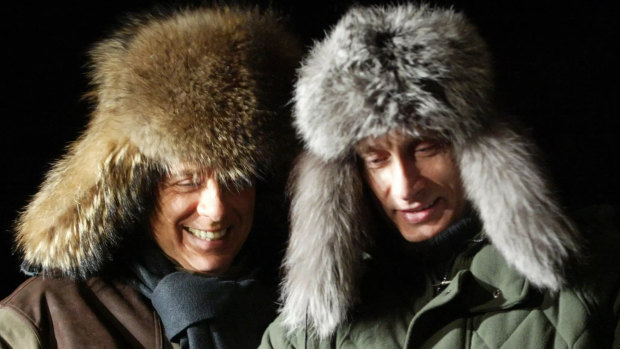 In younger days: Silvio Berlusconi (left) and Vladimir Putin at the latter’s country residence in Zavidovo, outside Moscow, in 2003.