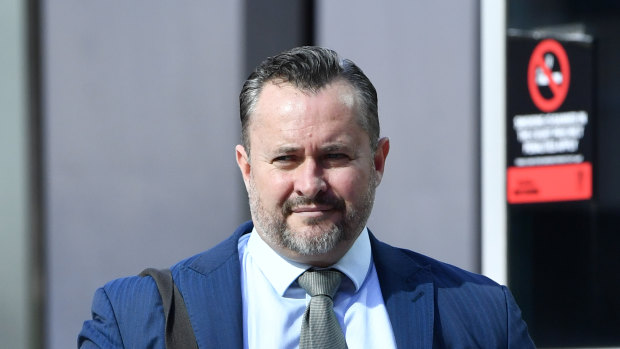 Adam Raydon Magill, who faces fraud and money laundering charges, was fined $1200 on Monday after last year calling barrister Alastair McDougall.
