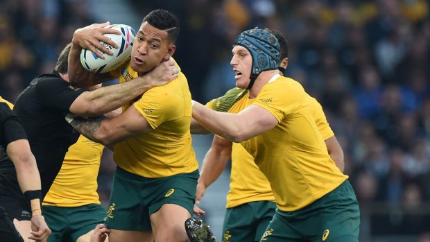 Contrast: Israel Folau and David Pocock in action during the 2015 Rugby World Cup final against New Zealand. 