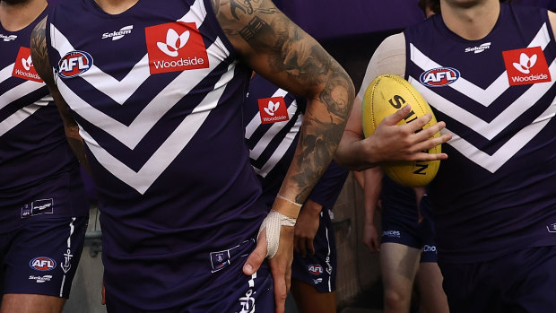 Some Fremantle Dockers supporters want the club to dump Woodside Energy as sponsor.