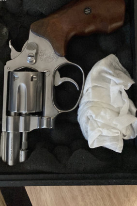 Police seized a handgun and ammunition.