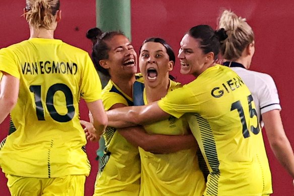 Sam Kerr celebrates her second goal against Great Britain.