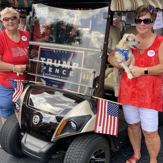 Friends Dorothy Sullivan and Carol McNeal at a pro-Trump golf cart parade in The Villages, Florida.
