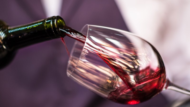 Is it acceptable for a waiter to turn my expensive red into a blend?