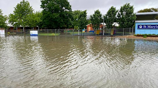 Flash flooding outside St Mary’s Primary School in Swan Hill.