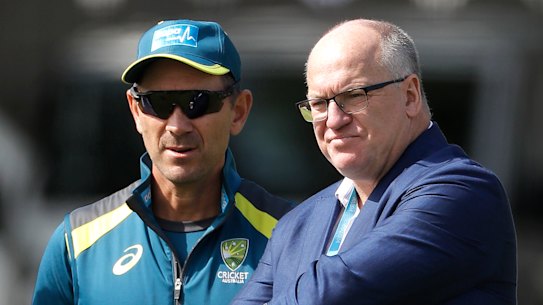 Justin Langer with Cricket Australia chairman Earl Eddings (right).