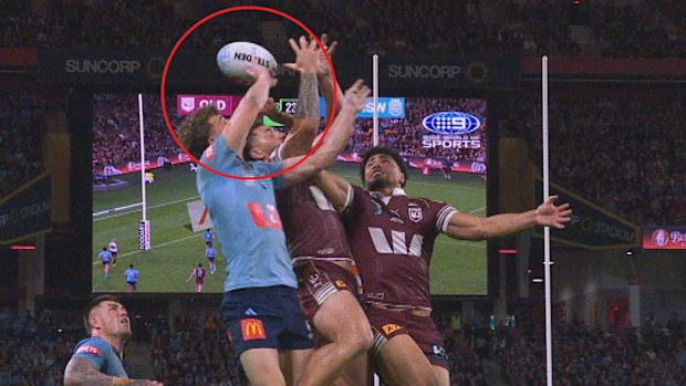 Jack Bostock touches the ball in the air.