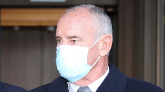 Chris Dawson (right) leaves the NSW Supreme Court with his solicitor, Greg Walsh, on Tuesday, May 24, 2022.