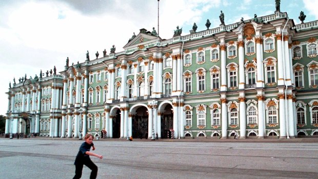 A boy skates in front of the Winter Palace in St. Petersburg, Russia. The Hermitage has a collection of nearly 3 million items in the Romanov's Winter Palace and surrounding Hermitage buildings that date from the 18th and 19th centuries.