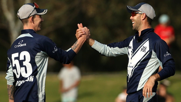 Nic Maddinson (left) and Glenn Maxwell celebrate the final WA wicket.