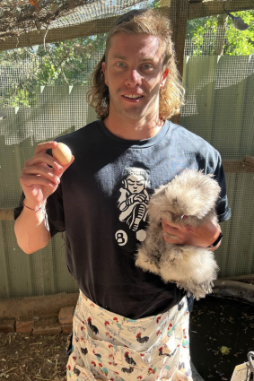 Olympic swimmer Matt Temple with his pet, Sid.