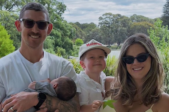 Maddinson holding new son Wilder, alongside August and wife Bianca.