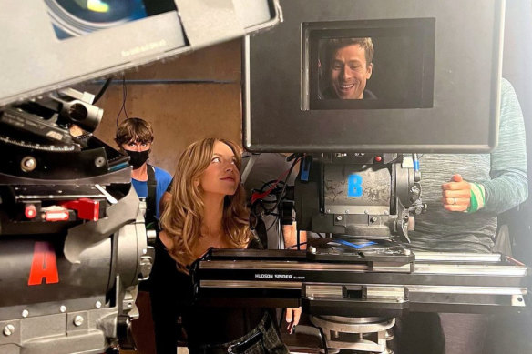 Sydney Sweeney and Glen Powell are all smiles on the set of their romcom.
