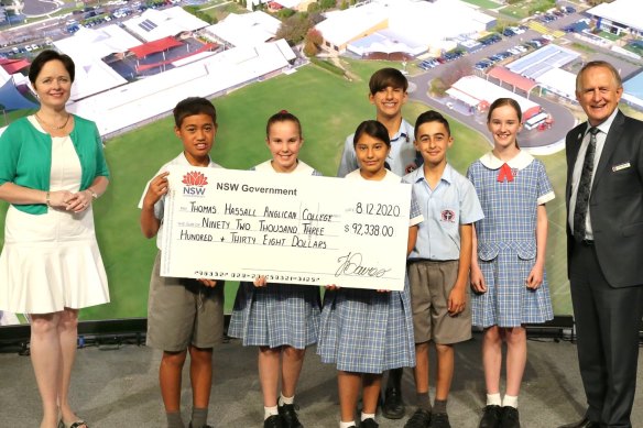 Mulgoa MP Tanya Davies at Thomas Hassall Anglican college presenting a grant for $92,338 for an “athletics precinct” and “refillable water stations” from the Community Building Partnership grants program.