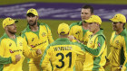 Australia's Josh Hazlewood, third right, celebrates with teammates the dismissal of England's Moeen Ali during the first ODI cricket match between England and Australia, at Old Trafford in Manchester, England.