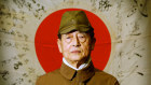 Former Japanese kamikaze pilot Hichiro Naemura wears his old uniform at London’s Imperial War Museum in 2002. 