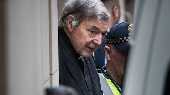 George Pell leaving the Supreme Court earlier this year.