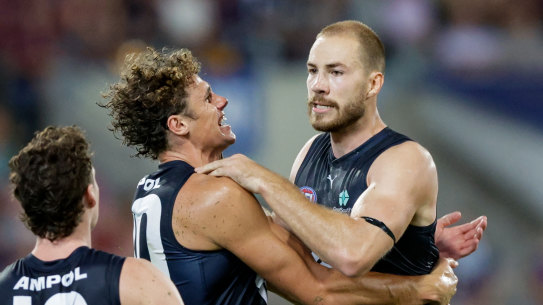 Harry McKay and Charlie Curnow celebrate at the Gabba.