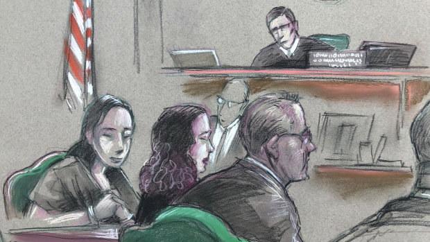 In a courtroom artist's sketch, Chinese woman, Yujing Zhang, left, listens to a hearing.