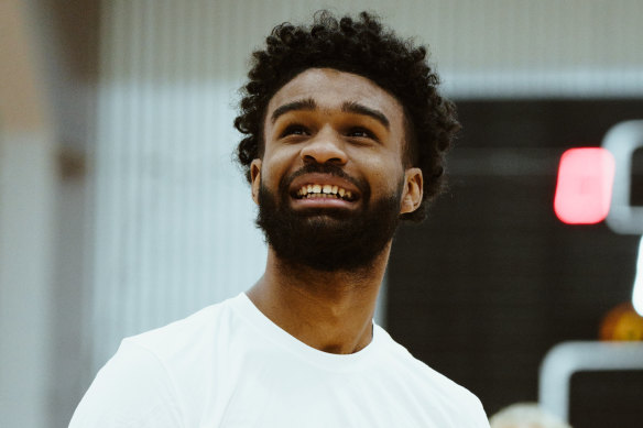 Chicago Bulls guard Coby White has a laugh at the NBA Basketball Without Borders Asia camp. 