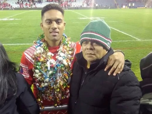 South Sydney forward Tevita “Junior” Tatola with his father, Tevita snr, after representing Tonga in a Test match.