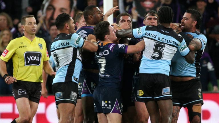 Scuffle: Tensions boil over after an Andrew Fifita late tackle just before Billy Slater scored his second try.