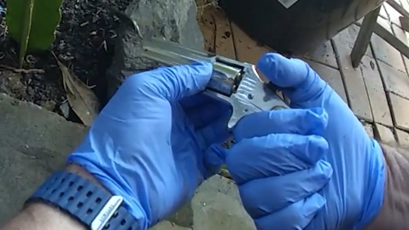 Loaded gun allegedly thrown from balcony during West End raid