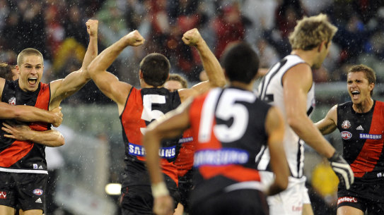 David Zaharakis with teammates celebrate after his match winning goal.