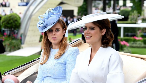 The Queen is said to adore princesses Beatrice and Eugenie, pictured here at Royal Ascot.