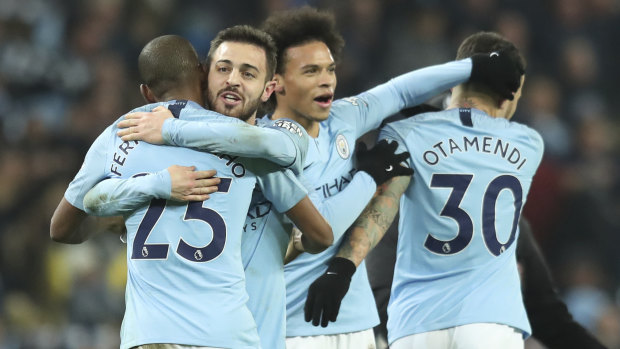 Manchester City celebrate their win over Liverpool.