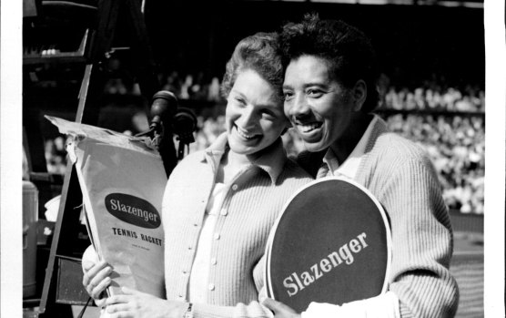 Britain's Angela Buxton (left) and America's Althea Gibson. They had just defeated the Australian pair, Fay Muller and Daphne Seeney in the women's doubles final at Wimbledon  July 09, 1956.