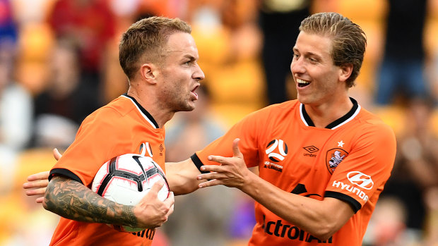 No time for celebrations: Adam Taggart looks to restart quickly after scoring the equaliser for Brisbane.