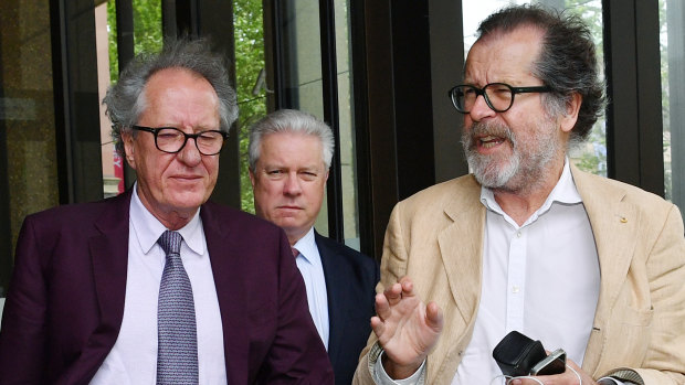 Theatre director Neil Armfield outside the Federal Court last week with Geoffrey Rush. 
