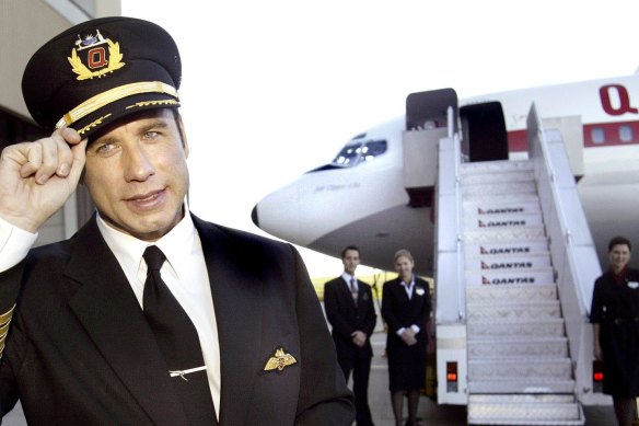 Former Qantas cheerleader John Travolta on a trip to Australia in 2003.
