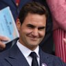 Swiss tennis great Roger Federer, who retired from professional tennis in 2022, waves to the crowd.