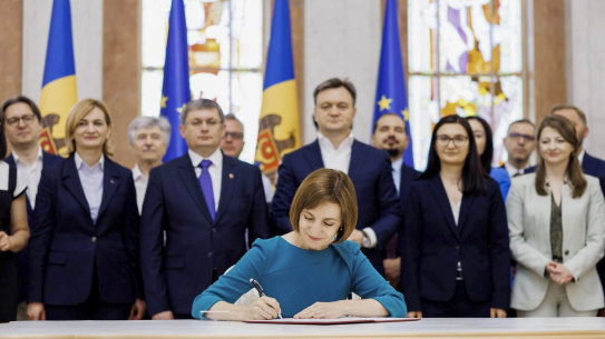 President Maia Sandu signs the decree initiating Moldova’s EU accession negotiations, in Chisinau in June.