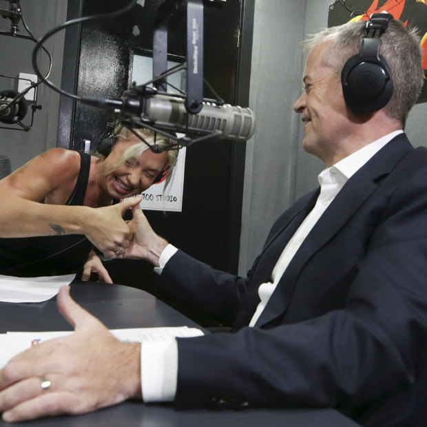 Opposition Leader Bill Shorten has a thumb war during a radio interview on Hot100 FM in Darwin.