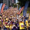 Bridge to Brisbane runners beat the real heat before a cooler week