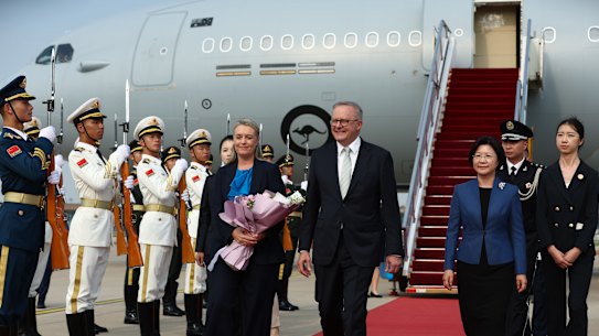 Prime Minister Anthony Albanese and his fiancée Jodie Haydon arrive in Beijing