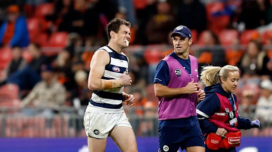 Jeremy Cameron of the Cats leaves the field.