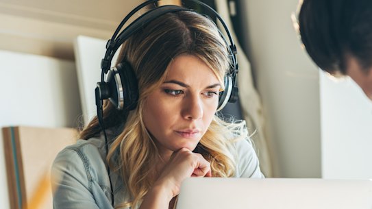 Wearing headphones in the office is a rising trend.