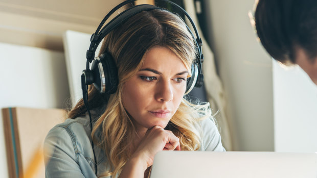 Headphone dependency is muting the office buzz