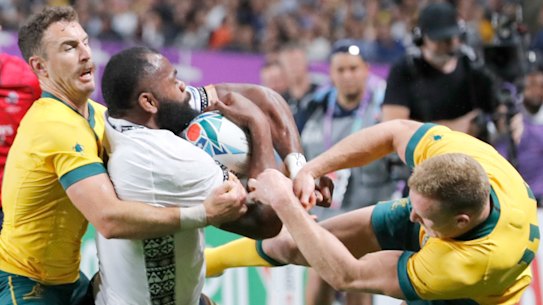 Reece Hodge bounces off Fiji's Peceli Yato following the tackle on Saturday which has seen him banned for three weeks.