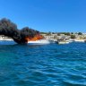 Emergency crews battle boat fire off popular Rottnest beach