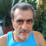 Perry Kouroumblis is charged with murdering two women on Easey Street, Collingwood, in 1977. 