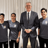 Home Affairs Minister Tony Burke with the five Iranian soccer players who were granted visas.