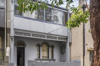 A Victorian terrace in Redfern, operating as a boarding house, passed in at auction. 